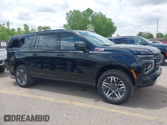 2025 Chevrolet Suburban Z71 z VIN 1GNS6DRD3SR228259, wystawiony jako IAAI lot #42381761 z przebiegiem 3 891 mil mil oraz . Historia ofert i sprzedaży dostępna na DreamBid. Obrazek 13.