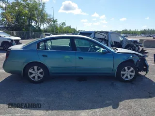 2002 Nissan Altima S z VIN 1N4AL11D22C116391, wystawiony jako IAAI lot #42263806 z przebiegiem 155 642 mil mil oraz . Historia ofert i sprzedaży dostępna na DreamBid. Obrazek 13.