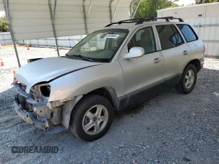2001 Hyundai Santa Fe GLS with VIN KM8SC83D31U010136, listed as a Copart auction lot 69809604 with 79,823 mi miles and Salvage Title. Bid and sale history available at carsss.com. Image 1.
