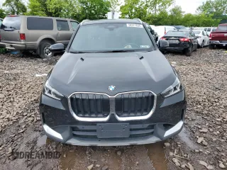 2023 BMW X1 xDrive28i with VIN WBX73EF03P5W45445, listed as a Copart auction lot 58377635 with 47,249 mi miles and Salvage title. Bid and sale history available at DreamBid. Image 5.