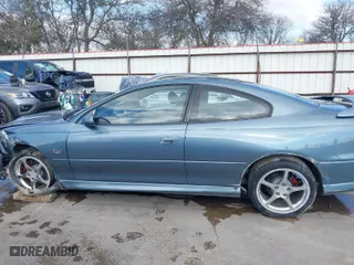 2006 Pontiac GTO with VIN 6G2VX12UX6L561098, listed as a IAAI auction lot 41487635 with 69,741 mi miles. Bid and sale history available at carsss.com. Image 14.
