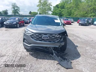 2022 Ford Edge SE z VIN 2FMPK4G97NBA53638, wystawiony jako IAAI lot #41799936 z przebiegiem 35 222 mil mil oraz . Historia ofert i sprzedaży dostępna na DreamBid. Obrazek 13.