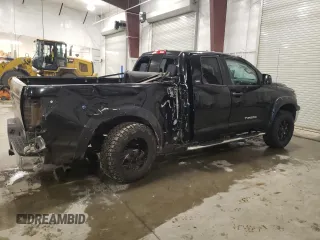 2010 Toyota Tundra 4WD Truck with VIN 5TFUM5F11AX006501, listed as a Copart auction lot 42424145 with 239,553 mi miles and Salvage Title. Bid and sale history available at carsss.com. Image 3.