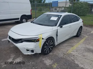 2023 Honda Civic EX-L with VIN 19XFL1H70PE014510, listed as a IAAI auction lot 42395890 with 14,163 mi miles and . Bid and sale history available at DreamBid. Image 2.