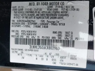 2012 Lincoln MKZ with VIN 3LNHL2GC6CR802963, listed as a IAAI auction lot 41421952 with 203,431 mi miles. Bid and sale history available at carsss.com. Image 9.
