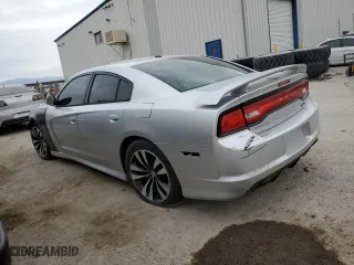 2012 Dodge Charger SRT8 with VIN 2C3CDXEJ6CH114987, listed as a Copart auction lot 87500795 with 165,176 mi miles and Salvage Title. Bid and sale history available at carsss.com. Image 2.