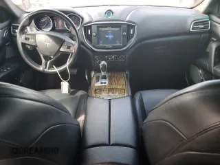 2014 Maserati Ghibli z VIN ZAM57XSA8E1087661, wystawiony jako Copart lot #54215595 z przebiegiem 108 280 mil mil oraz Szkoda całkowita • Salvage title. Historia ofert i sprzedaży dostępna na DreamBid. Obrazek 8.