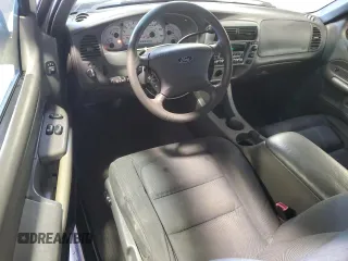 2002 Ford Explorer Sport Value z VIN 1FMYU70EX2UB69736, wystawiony jako Copart lot #76315924 z przebiegiem 109 492 mil mil oraz Szkody całkowita. Historia ofert i sprzedaży dostępna na DreamBid. Obrazek 8.