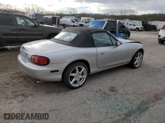 2001 Mazda MX-5 Miata with VIN JM1NB353510214097, listed as a Copart auction lot 50306595 with 111,359 mi miles and Salvage Title. Bid and sale history available at DreamBid. Image 3.
