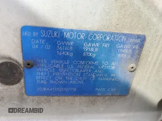 2002 Suzuki Aerio S z VIN JS2RA41S925107118, wystawiony jako Copart lot #50070535 z przebiegiem 128 111 mil mil oraz Szkoda całkowita • Salvage title. Historia ofert i sprzedaży dostępna na DreamBid. Obrazek 13.