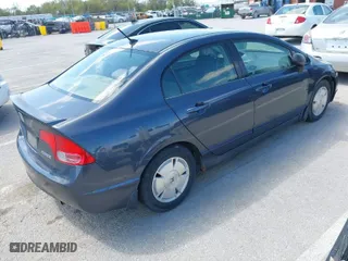 2007 Honda Civic Hybrid with VIN JHMFA362X7S027589, listed as a IAAI auction lot 42016320 with 181,110 mi miles. Bid and sale history available at carsss.com. Image 4.