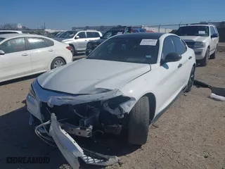 2018 Alfa Romeo Giulia Ti Sport with VIN ZARFAEEN9J7572787, listed as a IAAI auction lot 41646814 with 56,094 mi miles. Bid and sale history available at carsss.com. Image 2.