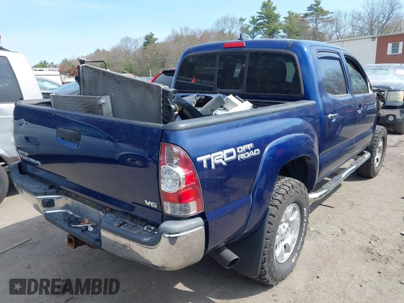 2014 Toyota Tacoma with VIN 3TMLU4EN0EM153558, listed as a IAAI auction lot 41964890 with 140,864 mi miles and . Bid and sale history available at DreamBid. Image 4.