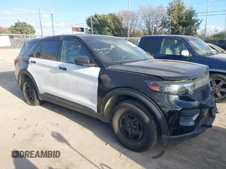 2020 Ford Police Interceptor Utility z VIN 1FM5K8ABXLGC63862, wystawiony jako IAAI lot #41146839 z przebiegiem Nie podano mil oraz . Historia ofert i sprzedaży dostępna na DreamBid. Obrazek 1.