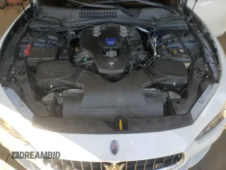 2017 Maserati Ghibli S Q4 z VIN ZAM57RTAXH1221570, wystawiony jako Copart lot #56003065 z przebiegiem 96 414 mil mil oraz Szkody całkowita. Historia ofert i sprzedaży dostępna na DreamBid. Obrazek 11.