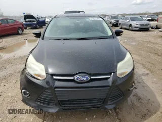 2013 Ford Focus SE z VIN 1FADP3F28DL292238, wystawiony jako Copart lot #51016715 z przebiegiem 165 699 mil mil oraz Szkoda całkowita • Salvage title. Historia ofert i sprzedaży dostępna na DreamBid. Obrazek 5.