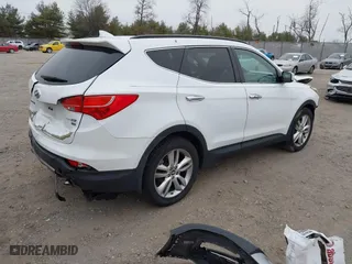 2013 Hyundai Santa Fe 2.0T Sport with VIN 5XYZUDLA9DG067638, listed as a IAAI auction lot 41781769 with 99,022 mi miles. Bid and sale history available at carsss.com. Image 4.