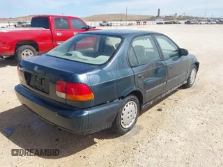 1997 Honda Civic DX with VIN 2HGEJ6623VH528179, listed as a IAAI auction lot 41756380 with 155,741 mi miles. Bid and sale history available at carsss.com. Image 4.