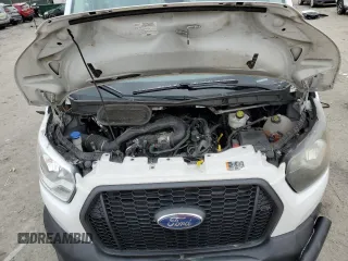 2021 Ford Transit Cargo с VIN 1FTBR3X84MKA93837, выставлен на аукционе Copart как лот 45632745 с пробегом 215 560 миль миль и Списание • Salvage title. История ставок и продаж доступна на DreamBid. Изображение 12.