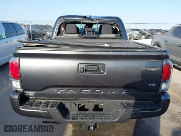 2023 Toyota Tacoma 4WD SR with VIN 3TMCZ5AN7PM587833, listed as a IAAI auction lot 41853887 with 16,532 mi miles. Bid and sale history available at carsss.com. Image 16.