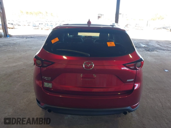 2018 Mazda CX-5 Grand Touring with VIN JM3KFBDM8J0461293, listed as a IAAI auction lot 41694070 with 72,240 mi miles. Bid and sale history available at carsss.com. Image 16.