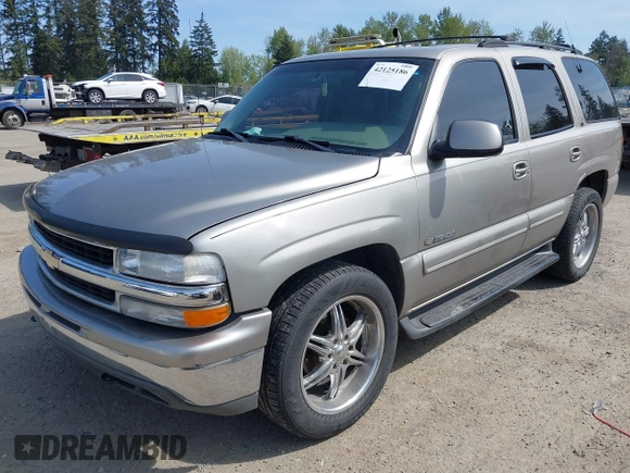 2001 Chevrolet Tahoe LS with VIN 1GNEK13T41J278818, listed as a IAAI auction lot 42125186 with 243,319 mi miles. Bid and sale history available at carsss.com. Image 2.