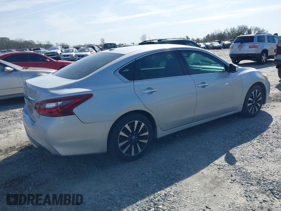 2018 Nissan Altima SR with VIN 1N4AL3AP6JC132730, listed as a IAAI auction lot 41585178 with 128,882 mi miles and . Bid and sale history available at DreamBid. Image 4.