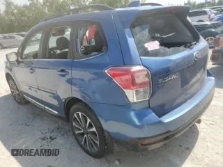 2017 Subaru Forester Touring with VIN JF2SJGTC2HH404923, listed as a Copart auction lot 58091885 with 101,317 mi miles and Salvage title. Bid and sale history available at DreamBid. Image 2.