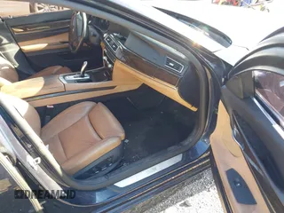 2011 BMW 7 Series 740i with VIN WBAKA4C52BC392112, listed as a IAAI auction lot 41736939 with 125,953 mi miles and . Bid and sale history available at carsss.com. Image 5.
