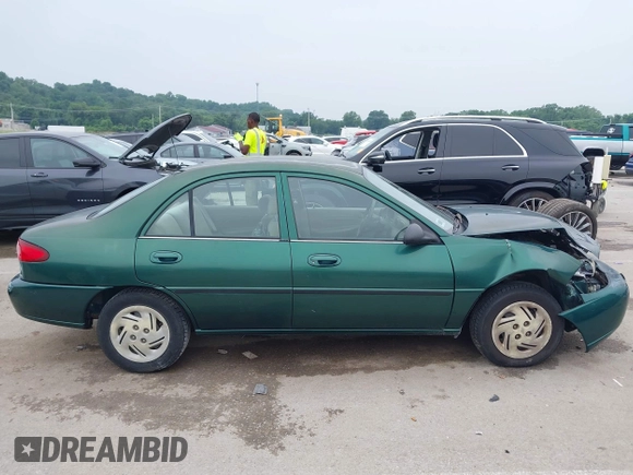 1999 Ford Escort LX z VIN 1FAFP10P1XW230023, wystawiony jako IAAI lot #42486934 z przebiegiem 41 468 mil mil oraz . Historia ofert i sprzedaży dostępna na DreamBid. Obrazek 13.