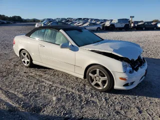 2009 Mercedes-Benz CLK-Class 3.5L with VIN WDBTK56FX9T108328, listed as a Copart auction lot 74586884 with 49,660 mi miles and Salvage Title. Bid and sale history available at carsss.com. Image 4.