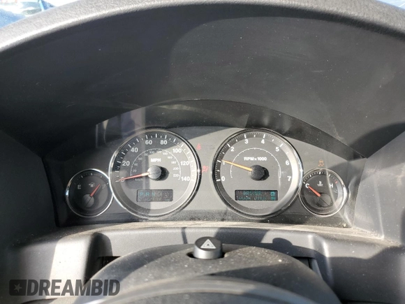 2006 Jeep Commander with VIN 1J8HH48N46C133122, listed as a Copart auction lot 80821094 with 216,412 mi miles and Salvage Title. Bid and sale history available at carsss.com. Image 9.