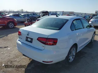 2017 Volkswagen Jetta SEL z VIN 3VWL17AJ0HM258163, wystawiony jako IAAI lot #41853477 z przebiegiem 48 243 mil mil oraz . Historia ofert i sprzedaży dostępna na DreamBid. Obrazek 4.