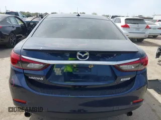2016 Mazda 6 i Grand Touring with VIN JM1GJ1W59G1439075, listed as a IAAI auction lot 41792755 with 99,215 mi miles and . Bid and sale history available at DreamBid. Image 16.