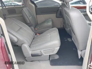 2009 Chrysler Town & Country Touring with VIN 2A8HR54169R618640, listed as a IAAI auction lot 42210905 with 227,420 mi miles and . Bid and sale history available at DreamBid. Image 8.