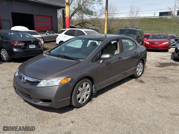 2010 Honda Civic Sdn LX with VIN 19XFA1F54AE032510, listed as a Copart auction lot 50771455 with 73,660 mi miles and Salvage Title. Bid and sale history available at carsss.com. Image 2.