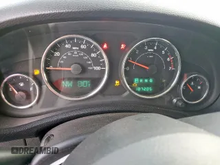 2012 Jeep Wrangler Unlimited Altitude with VIN 1C4HJWEGXCL180602, listed as a Copart auction lot 61391095 with 187,205 mi miles and Salvage title. Bid and sale history available at DreamBid. Image 9.