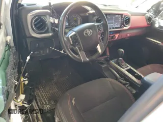 2021 Toyota Tacoma 4WD SR5 with VIN 3TMDZ5BN4MM103311, listed as a Copart auction lot 46486445 with 125,685 mi miles and Salvage Title. Bid and sale history available at carsss.com. Image 8.