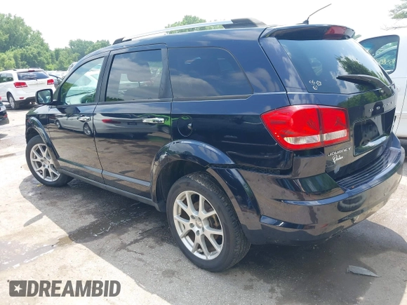 2011 Dodge Journey Crew with VIN 3D4PG3FGXBT511854, listed as a IAAI auction lot 42390292 with 145,991 mi miles and . Bid and sale history available at DreamBid. Image 3.