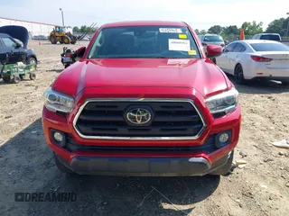 2018 Toyota Tacoma SR with VIN 5TFCZ5AN7JX163344, listed as a IAAI auction lot 40008984 with 93,598 mi miles. Bid and sale history available at carsss.com. Image 12.