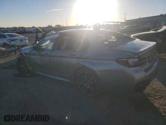 2021 BMW M5 with VIN WBS83CH0XMCH58055, listed as a Copart auction lot 79473464 with 0 mi miles and Salvage Title. Bid and sale history available at carsss.com. Image 2.