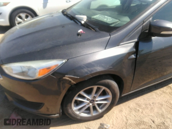 2015 Ford Focus SE with VIN 1FADP3F28FL292520, listed as a IAAI auction lot 41906723 with 74,106 mi miles. Bid and sale history available at carsss.com. Image 6.
