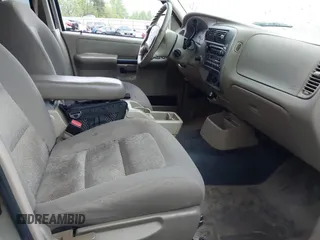 2003 Ford Explorer Sport Trac XLS z VIN 1FMZU67E73UC81240, wystawiony jako IAAI lot #41980985 z przebiegiem 114 644 mil mil oraz . Historia ofert i sprzedaży dostępna na DreamBid. Obrazek 5.