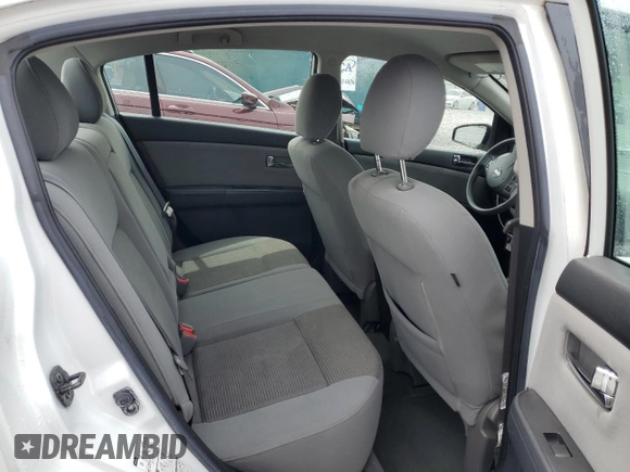 2011 Nissan Sentra S z VIN 3N1AB6AP3BL617933, wystawiony jako Copart lot #56425975 z przebiegiem 107 877 mil mil oraz Szkoda całkowita • Salvage title. Historia ofert i sprzedaży dostępna na DreamBid. Obrazek 10.