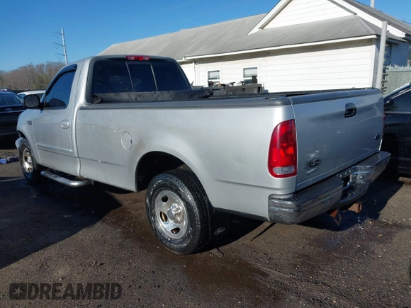 2002 Ford F-150 XL with VIN 1FTRF17242NA48027, listed as a IAAI auction lot 41838636 with 69,821 mi miles. Bid and sale history available at carsss.com. Image 3.
