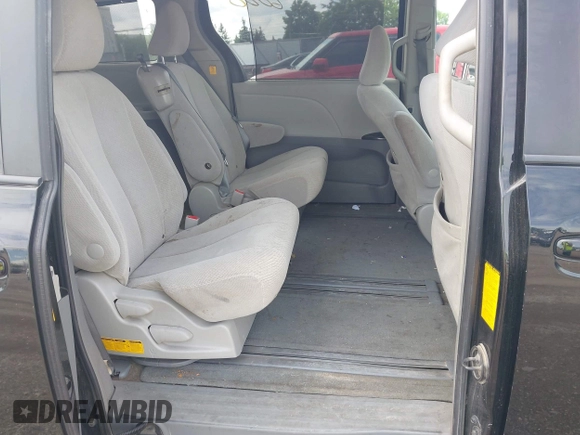 2013 Toyota Sienna LE AAS with VIN 5TDKK3DC3DS392029, listed as a IAAI auction lot 42366000 with 199,237 mi miles and . Bid and sale history available at DreamBid. Image 8.