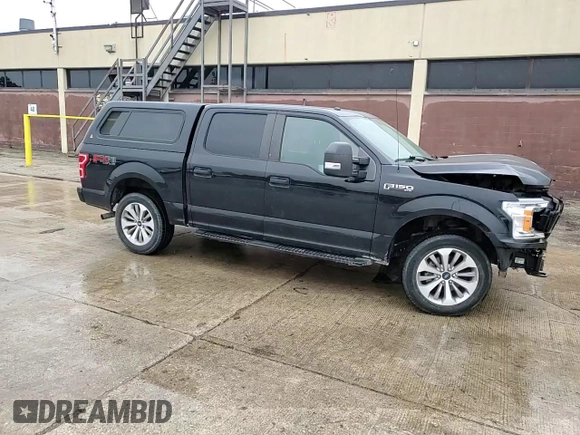 2018 Ford F-150 XL with VIN 1FTEW1EG0JFD10941, listed as a Copart auction lot 57855095 with 119,345 mi miles and Salvage title. Bid and sale history available at DreamBid. Image 13.