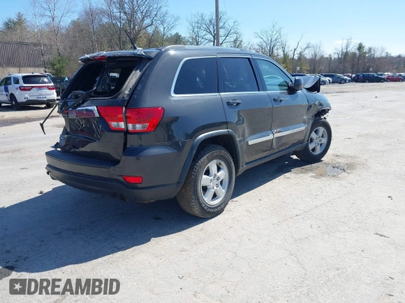 2011 Jeep Grand Cherokee Laredo z VIN 1J4RR4GG9BC519132, wystawiony jako IAAI lot #41931266 z przebiegiem 118 534 mil mil oraz . Historia ofert i sprzedaży dostępna na DreamBid. Obrazek 4.