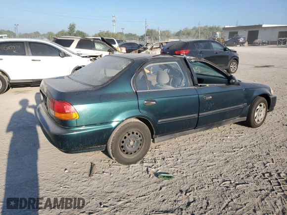 1997 Honda Civic LX with VIN 1HGEJ6570VL028030, listed as a Copart auction lot 69479674 with 160,958 mi miles and Salvage Title. Bid and sale history available at carsss.com. Image 3.