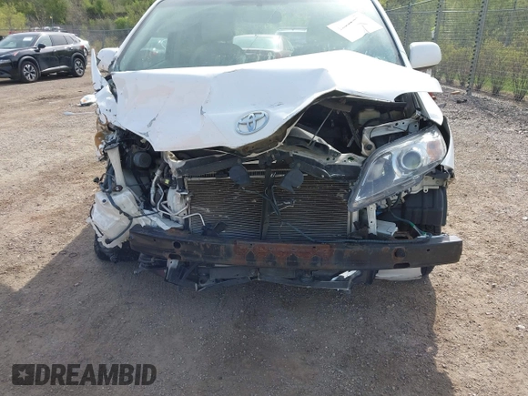 2014 Toyota Sienna LE AAS with VIN 5TDKK3DC0ES439163, listed as a IAAI auction lot 42155274 with Not provided miles and . Bid and sale history available at DreamBid. Image 6.